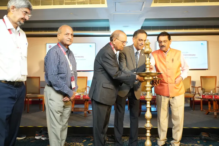 Guests of honour light the traditional lamp at WPU GŌA’s doctoral launch ceremony