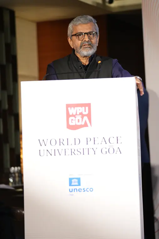 Guest speaker at the WPU GŌA podium during the doctoral launch