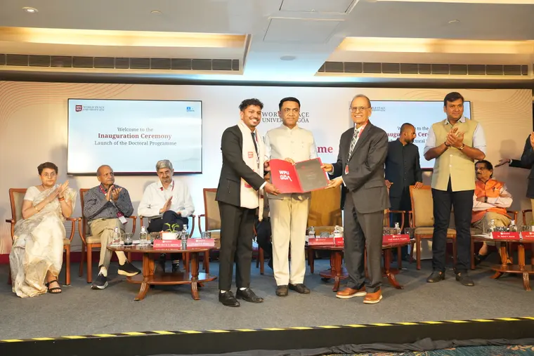 A Ph.D. scholar is presented with a stole and Certificate of Enrolment at the WPU GŌA doctoral launch