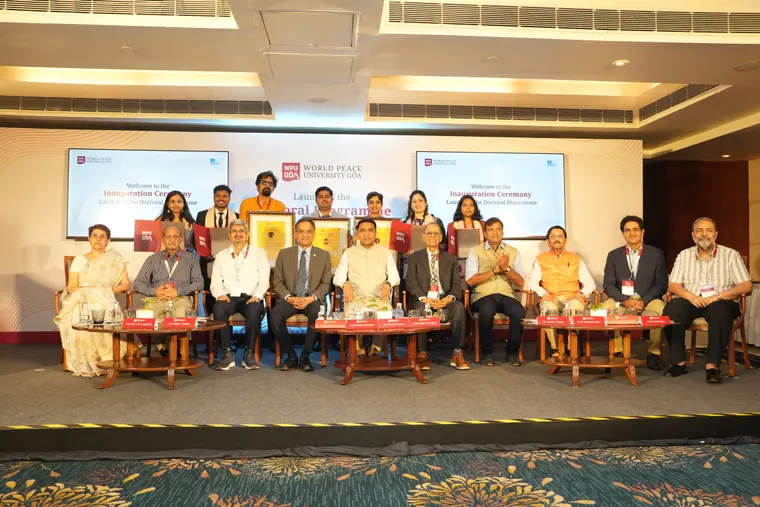 Group photograph of dignitaries, awardees and scholars at the WPU GŌA doctoral launch