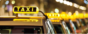 City taxis waiting in a queue — the urban transport problem ride-sharing platforms address